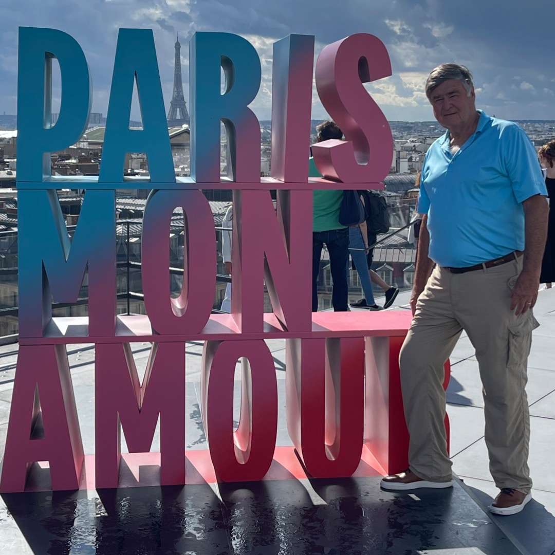 Rooftop photo with Cos next to Paris Mon Amour sign